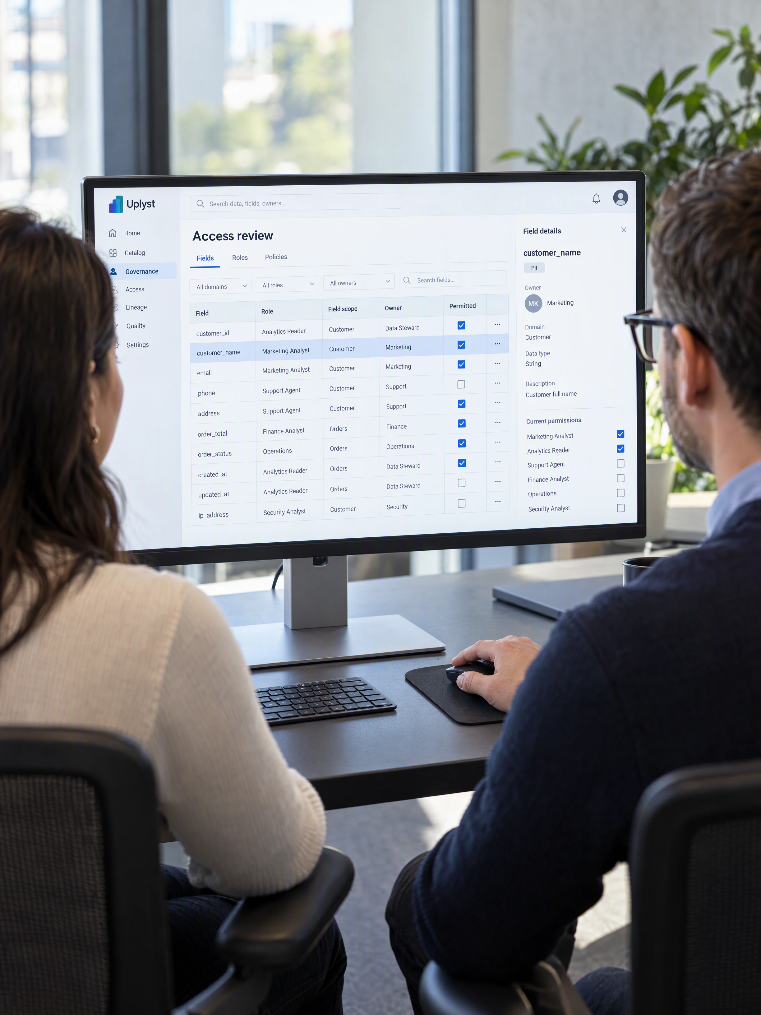 A data steward and business owner examine permitted fields and responsibilities in an access review.