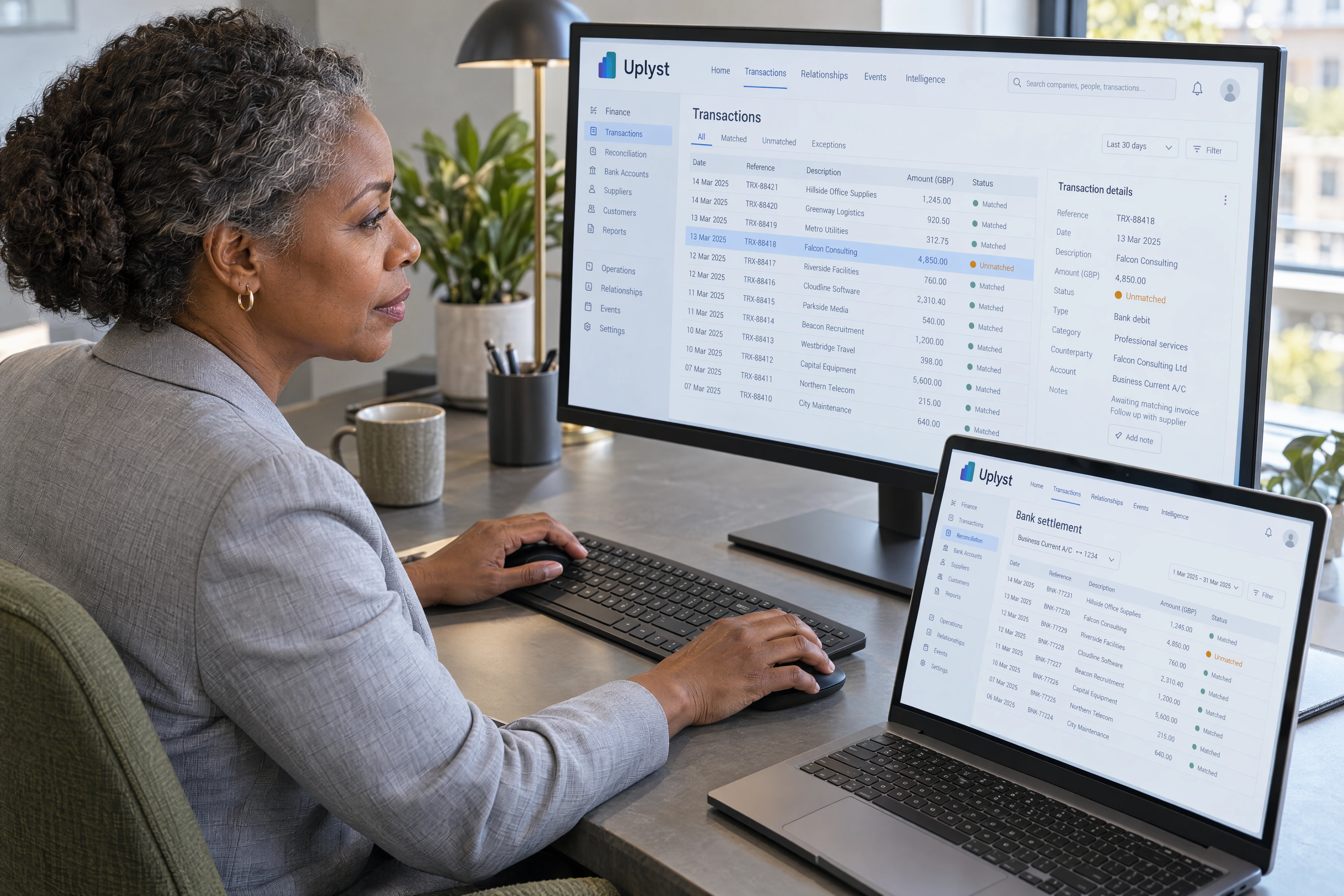 A finance analyst compares an unmatched transaction with its bank settlement record