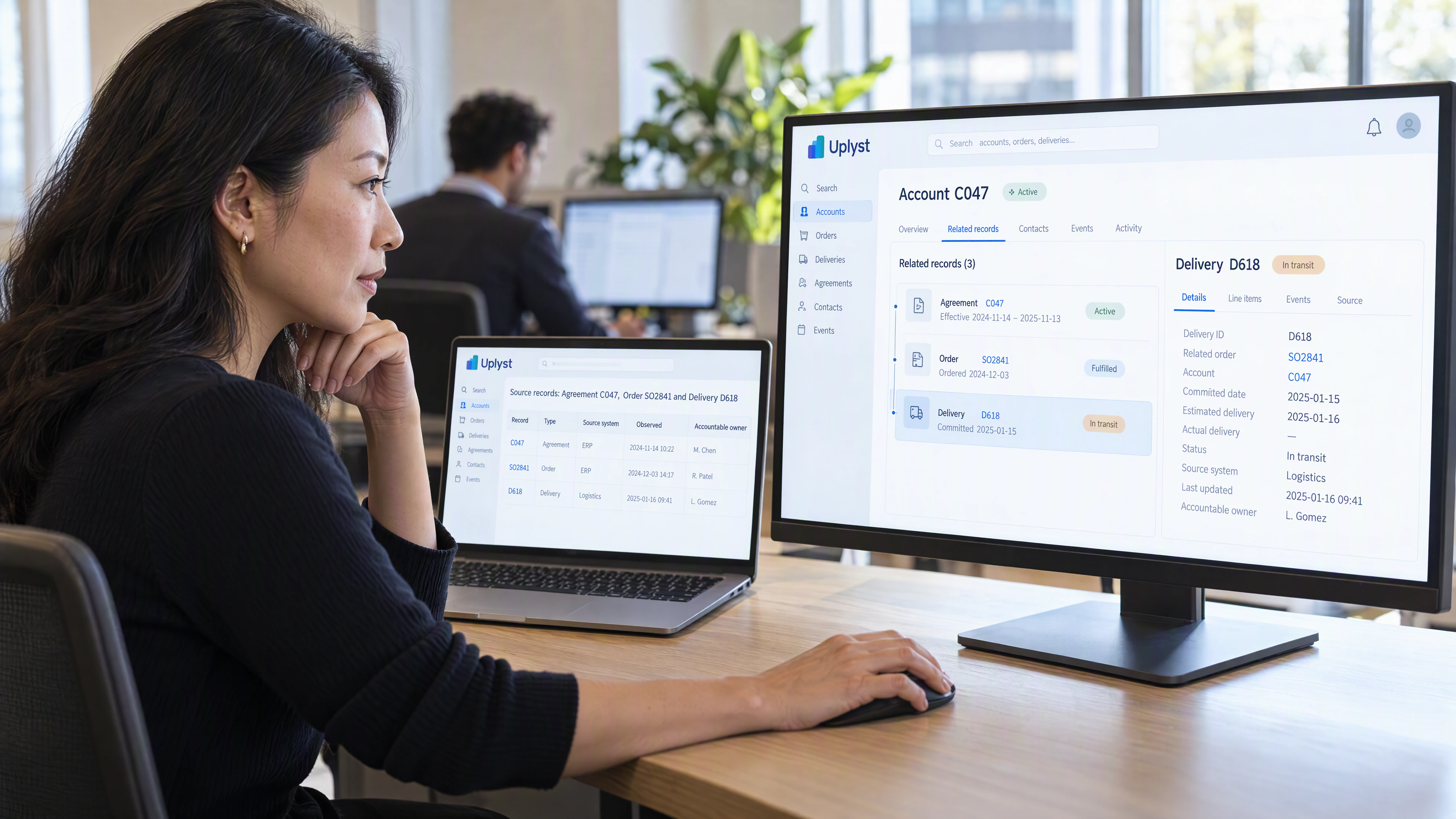 An analyst compares source records for an account, order and delivery with their related business records.
